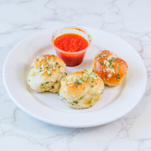 Garlic Knots w Tomato Sauce side
